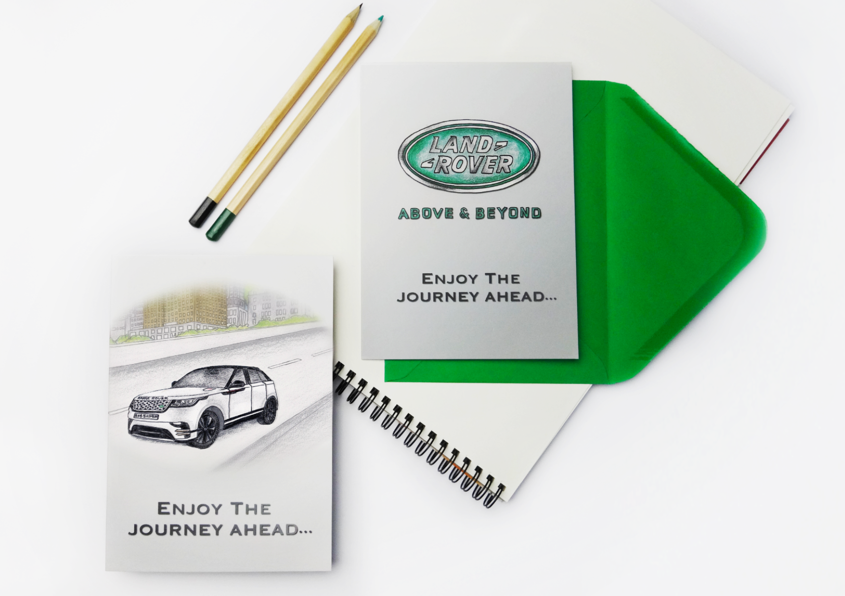 Two company greeting cards for Land Rover car dealership, featuring bespoke illustrations of a Land Rover Velar and the Land Rover logo.
